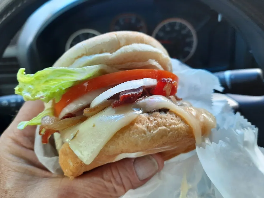Bacon Cheese Burger with Pepper Jack Tomato Onion Lettuce and Mayo